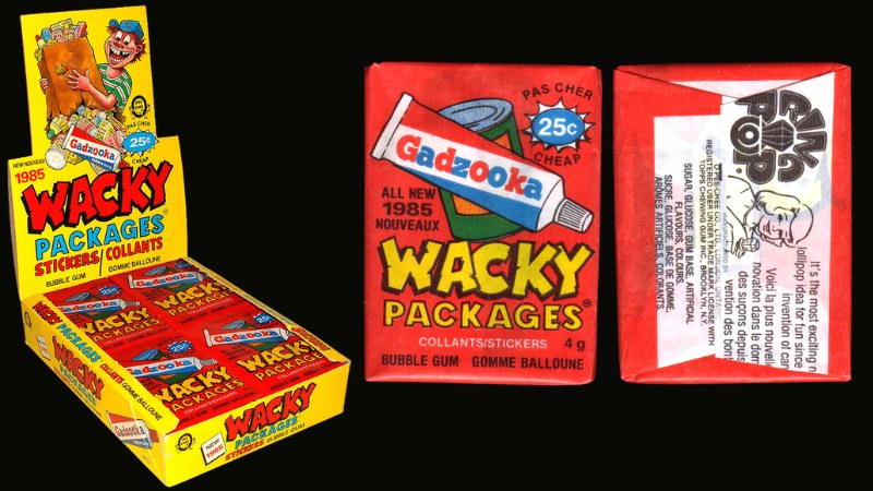 1985 OPC Wacky Packages display box (yellow, 25 cents) alongside a red wax pack with All New 1985 branding and the Ring Pop ad on the back